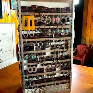 NEW 111 PAPARAZZI EARRINGS WITH ROTATING DISPLAY CASE NWT. 111 pieces